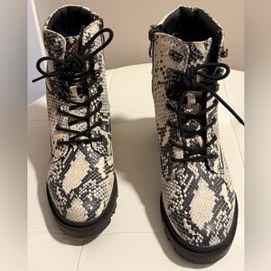 Snake print zip up boots